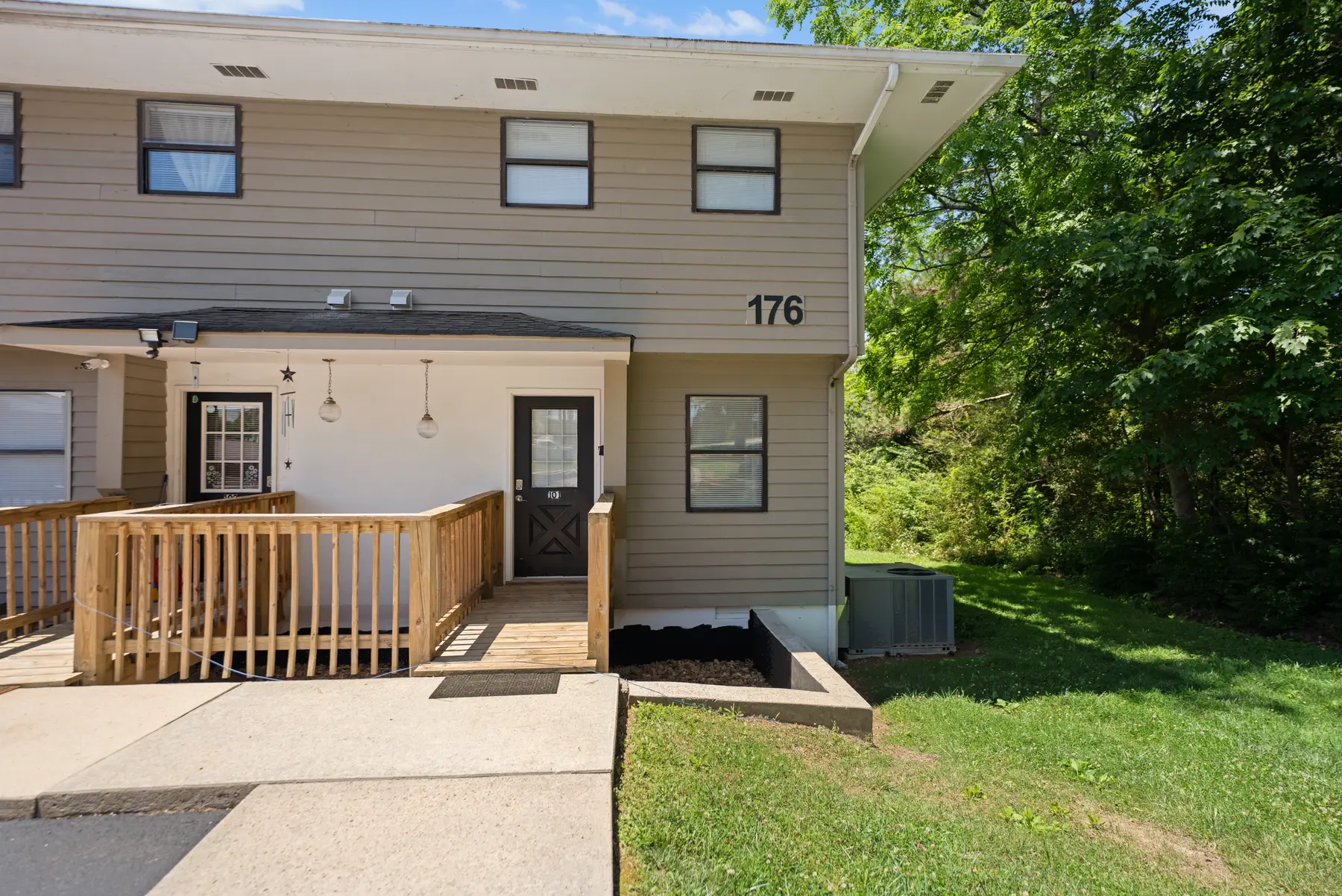 Exterior entrance of 176 Pointe Landing Unit 101 end unit