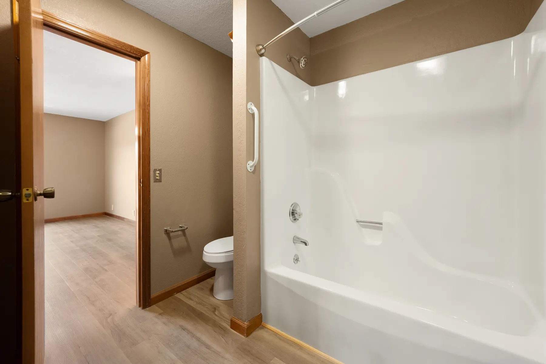 Full bathroom tub and shower in Unit 101