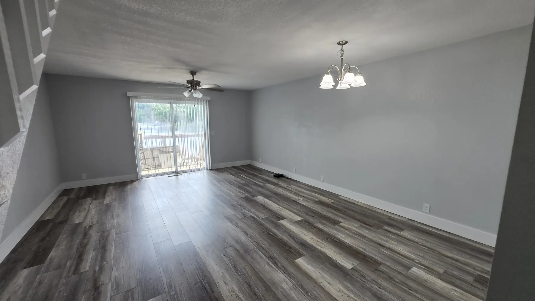 Renovated open living and dining room in 176 Pointe Landing Unit 103