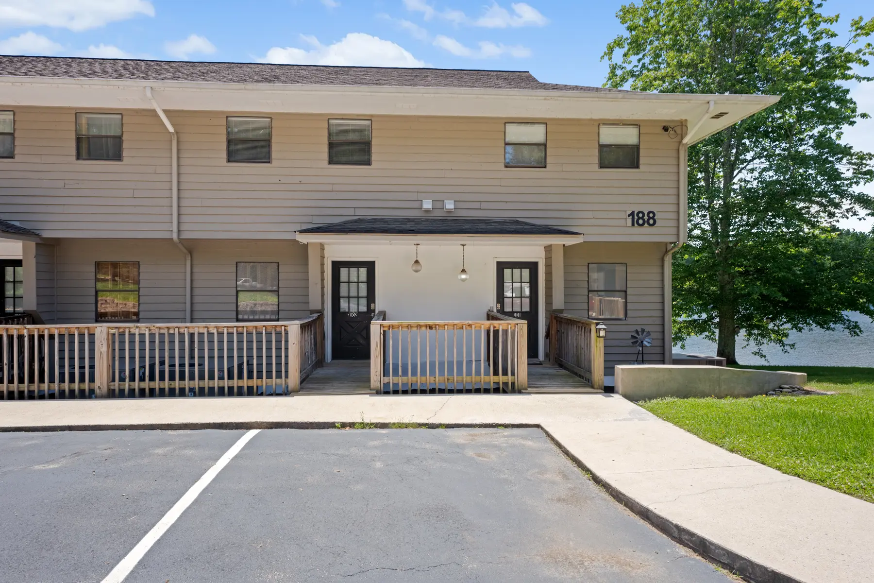 Exterior entrance and parking area at 188 Pointe Landing Unit 102