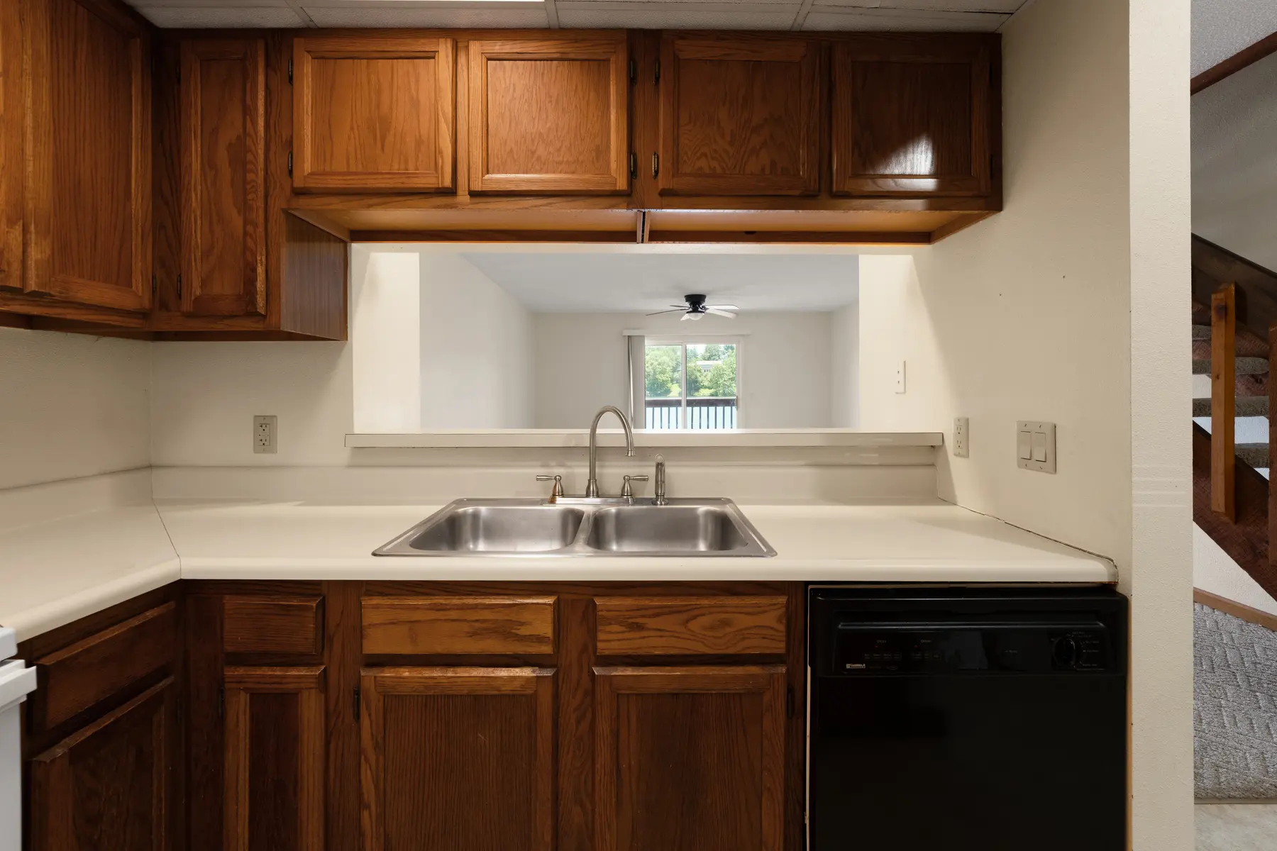 Kitchen sink and pass-through window in Unit 102