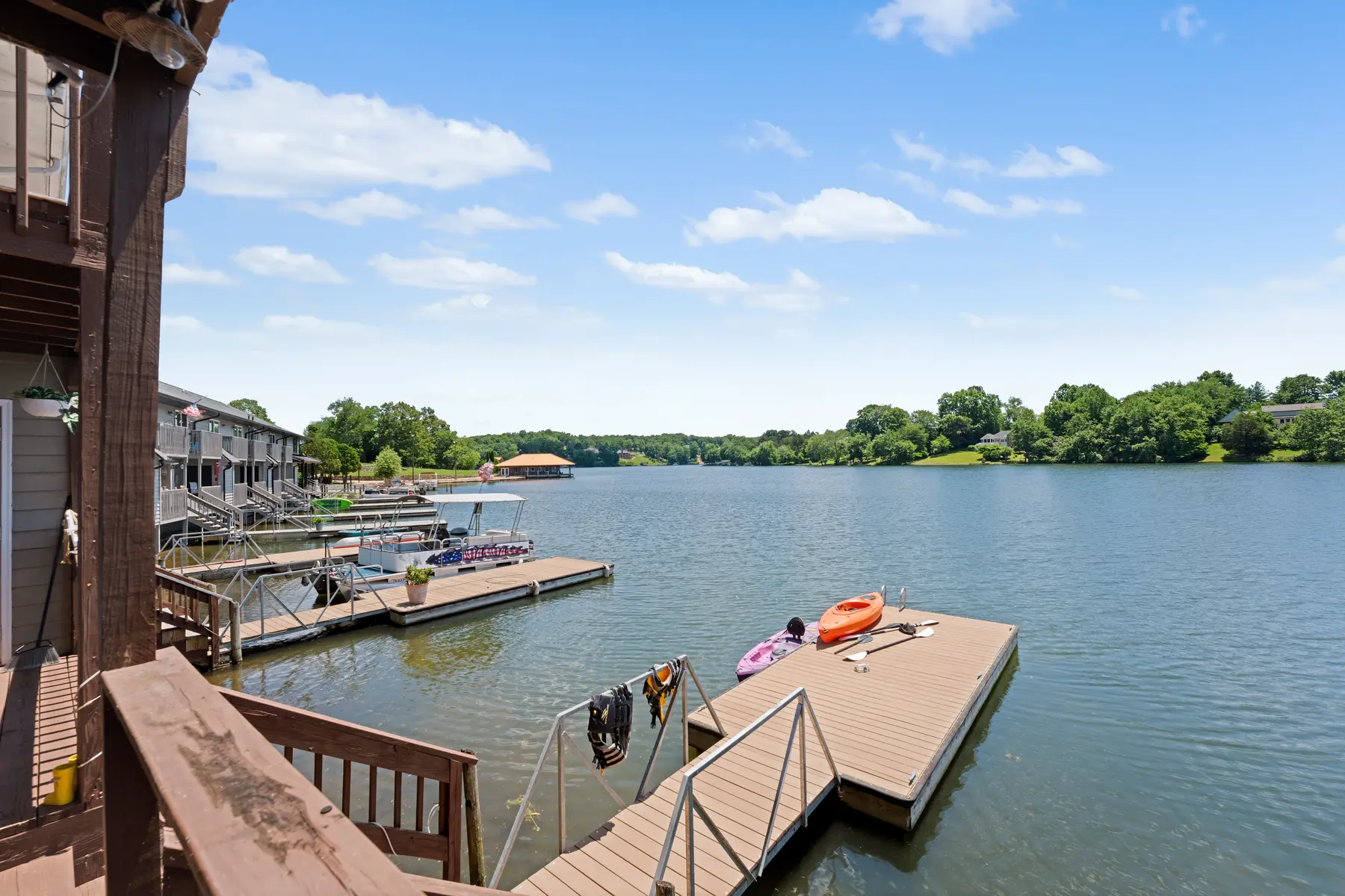 Shared dock and lake view below the Unit 102 balcony