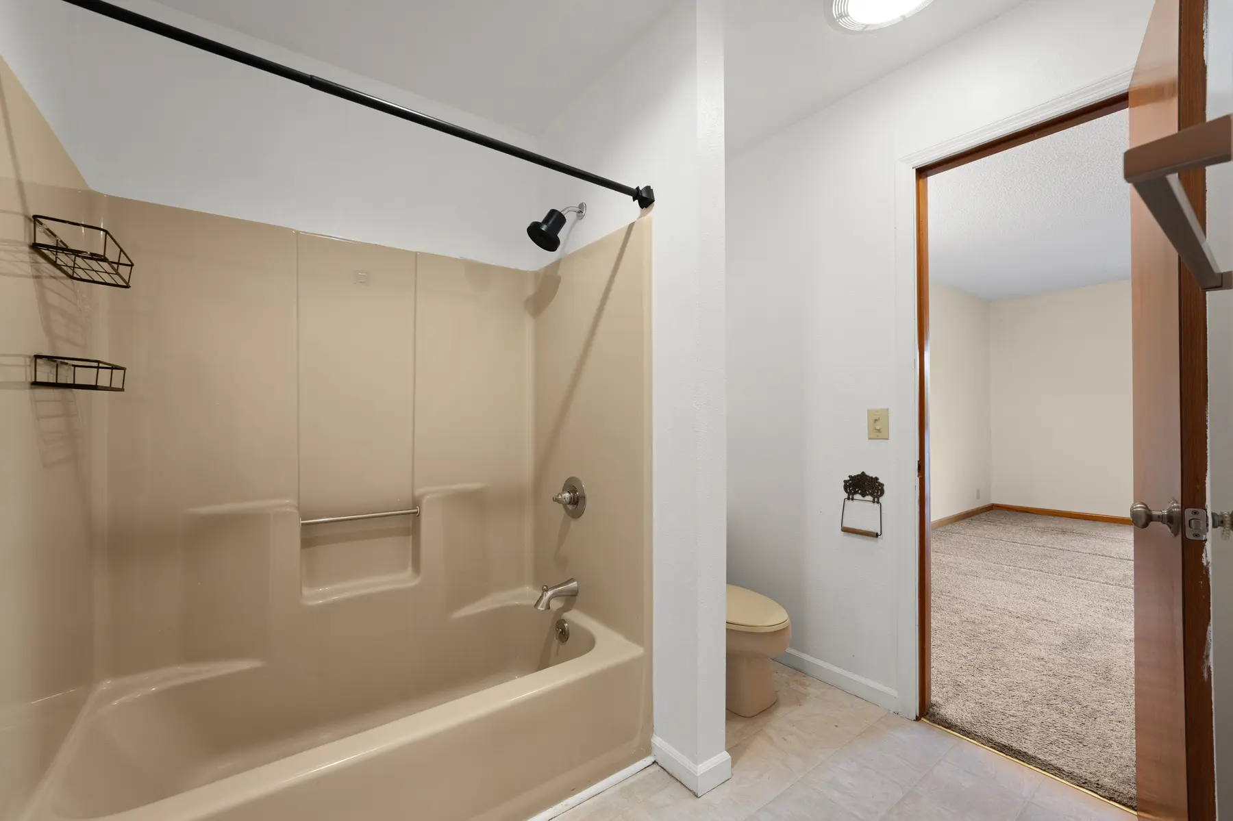 Full bathroom tub and shower in Unit 102