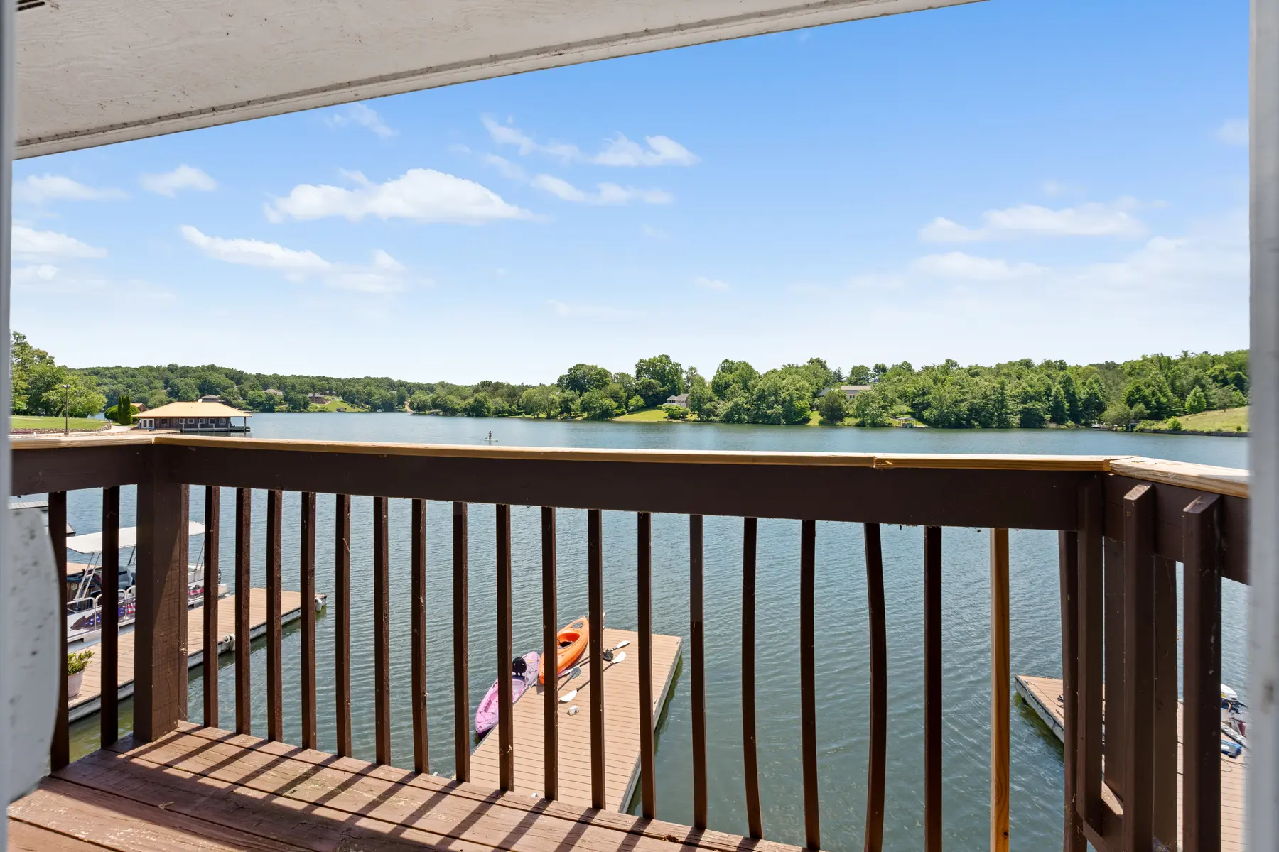Lake view from the primary bedroom balcony in Unit 102