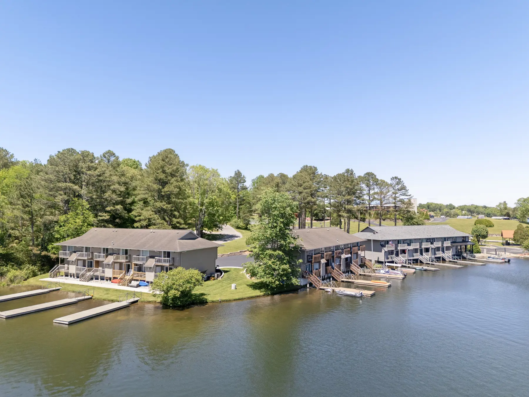 Pointe Landing shoreline, condos, and docks from above