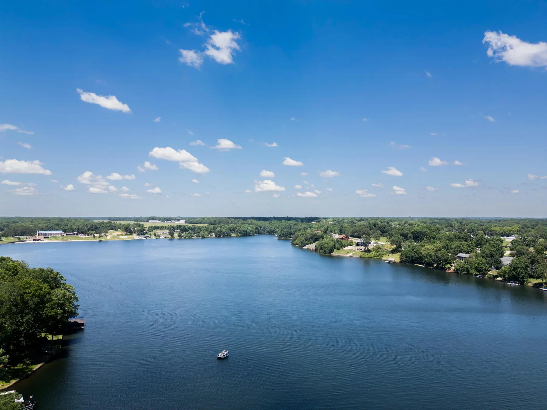 Lake Holiday shoreline and wooded landscape from above