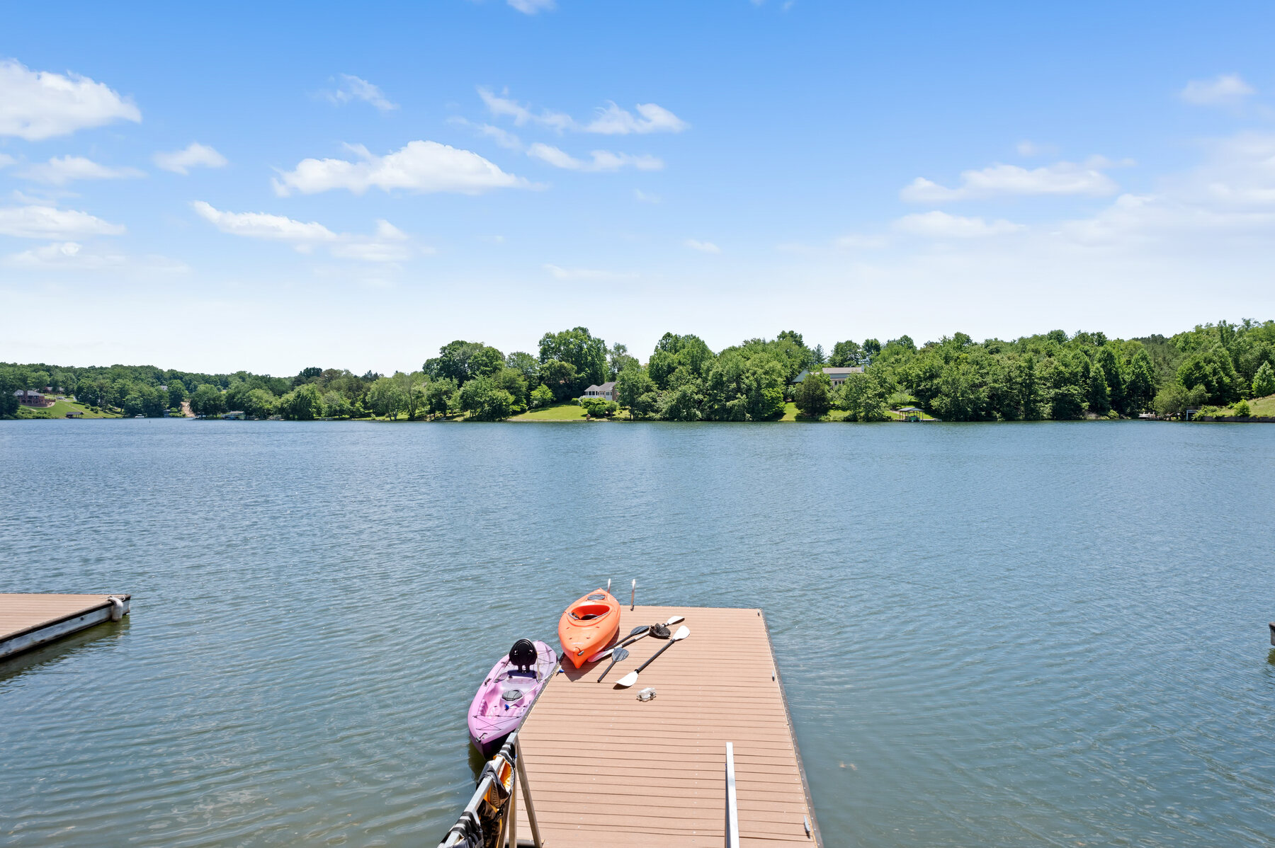 Kayaks beside the dock on Lake Holiday
